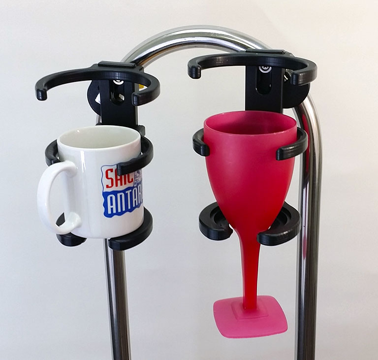 The Universal Tumbler Holder will hold every kind of wine glass, coffee  cup, cans and bottles. The drink holder is compatible with many various  wheelchairs, power chairs, electric wheelchairs, mobility scooters, and